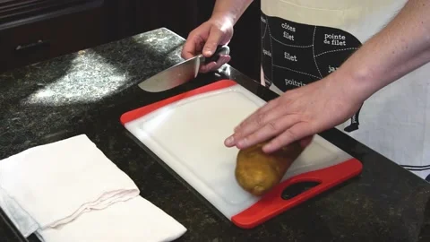 Man Cutting Food In A Kitchen Stock Footage 137269609