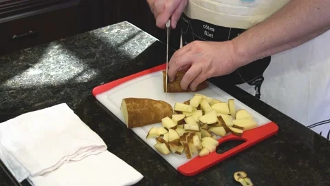 Man Cutting Food In A Kitchen Stock Footage 137269701