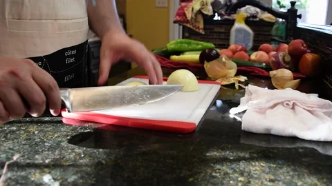 Man Cutting Food In A Kitchen Stock Footage 137270109