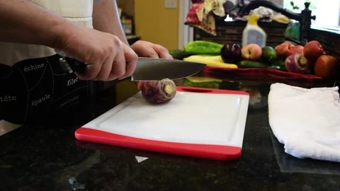 Man Cutting Food In A Kitchen Stock Footage 137270110