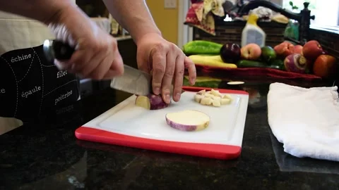 Man Cutting Food In A Kitchen Stock Footage 137270129