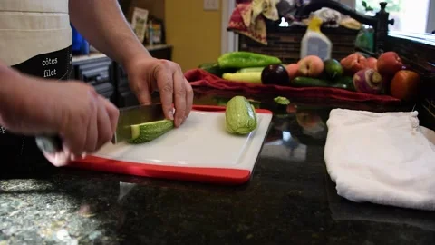 Man Cutting Food In A Kitchen Stock Footage 137270449