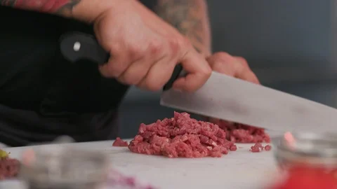 Man cutting fresh meat raw lunch condiment preparation beef board cooking food Stock Footage 103289163