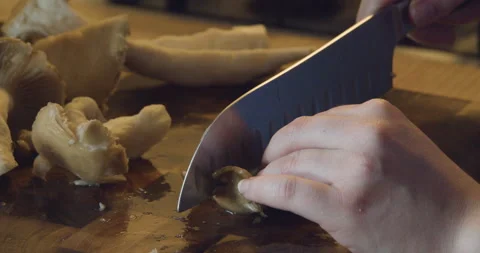 Man Cutting Fresh Mushrooms Stock Footage 142848701