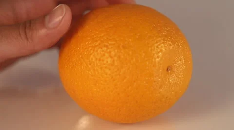Man cutting fresh orange on kitchen Stock-Footage 6331236