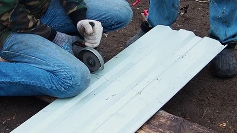 Man cutting grinding machine, angle grinder metal sheet. Stock Footage 108712939