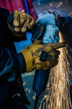 Man cutting iron Stock Photos