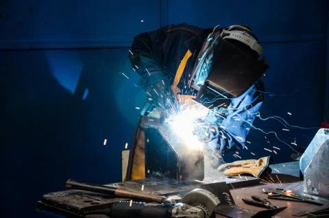 Man cutting iron Stock Photos