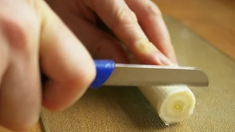 Man cutting leek Stock Footage 71472592