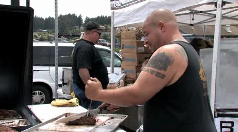 Man Cutting Meat 2 Stock Footage 10564430