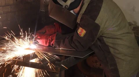 Man cutting metal Stock Footage 62865188