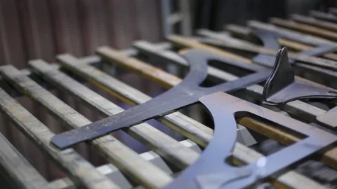 Man cutting metal using grinding machine in hangar Stock Footage 139587056