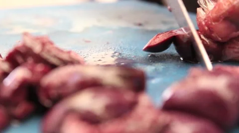 Man cutting olives for a salad.  Stock Footage 65201137
