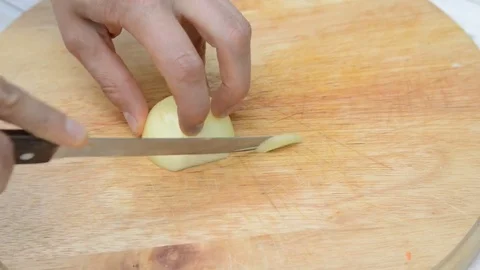 Man cutting onion Stock Footage 82530626