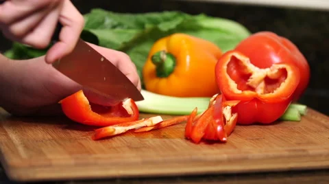 Man cutting red bell pepper close up Stock Footage 61395631