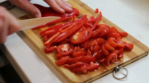 Man cutting red bell pepper Stock Footage 67009383