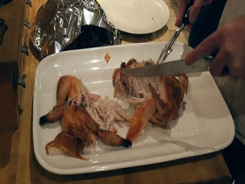 Man cutting roast duck. Video stock 84187882