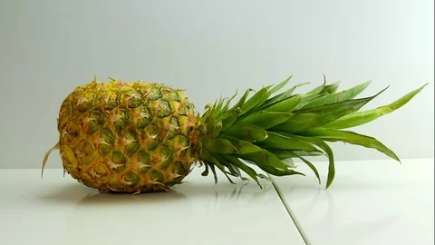 Man cutting slicing pineapple Stock Footage 75499898