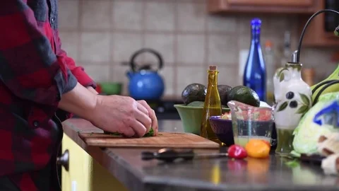 Man cutting spinach Stock Footage 70336734