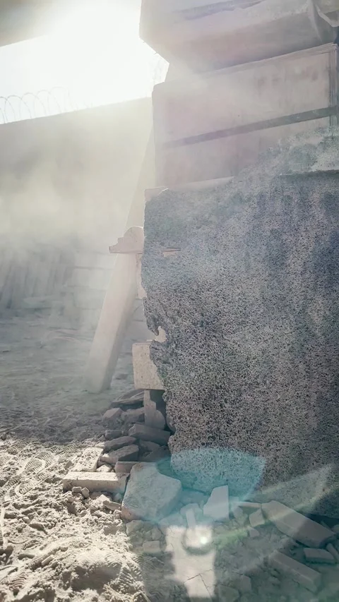 Man cutting stone generating dust that is almost invisible in space Stock Footage 249311451