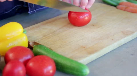 Man cutting tomato Stock Footage 40986608