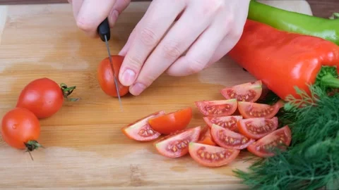 Man cutting tomato Stock Footage 232874999