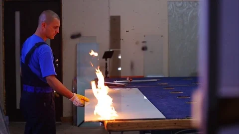 Man cutting a triplex glass in the workshop Stock Footage 69916630