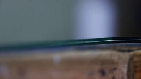 Man cutting a triplex glass in the workshop Stock Footage 69916655