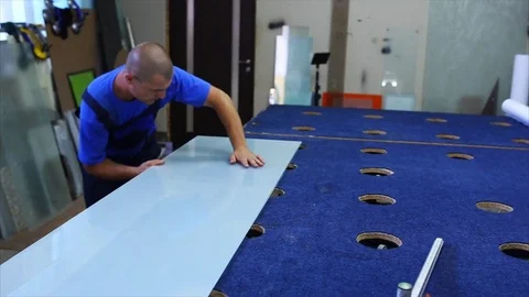 Man cutting a triplex glass in the workshop Stock Footage 69916884