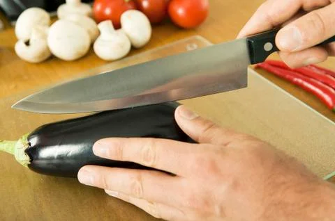 Man cutting vegetables, elevated view Stock Photos