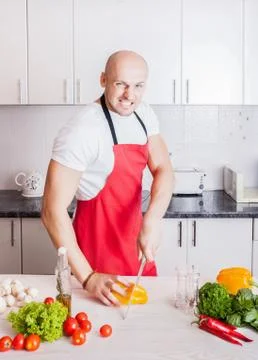 Man cutting vegetables Stock Photos
