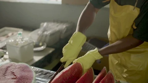 Man Cutting Watermelon Stock Footage 105666081