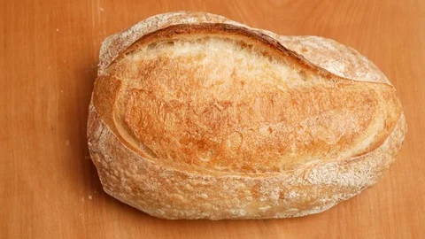 Man cutting white bread. Stock Footage 71567139