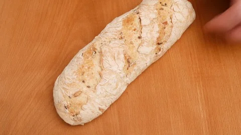 Man cutting white bread. Stock Footage 71914223