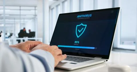 Man With Cybersecurity Software Protects Laptop From Online Cyber Attacks. Pr Stock Photos