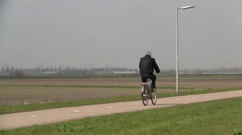 Man cycling on bicycle Stock Footage 2541779