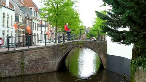 Man cycling on the bridge Stock Footage 107943838