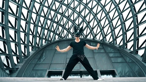 Man dance in mask in city Video stock 98989708