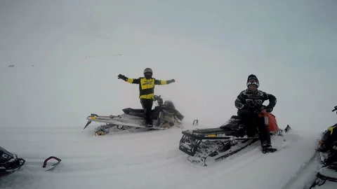 Man dance next to a snowmobile Stock-Footage 102159521