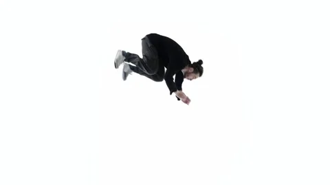 A man dancer jumps flip, stands on the floor in an unusual position with legs up Stock Footage 274940570