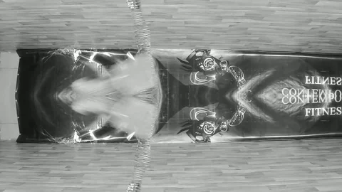 Man Dancer Performs Acrobatic Dance On Front Of Camera In Black White Stock Footage 85194356