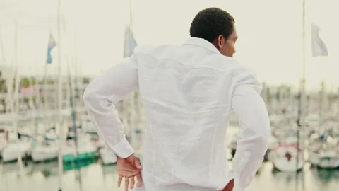 Man Dances Joyfully by the Marina Stock Footage 317567802
