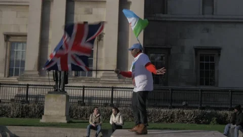 A Man Dances In Trafalgar Square 2 Stock Footage 145566414