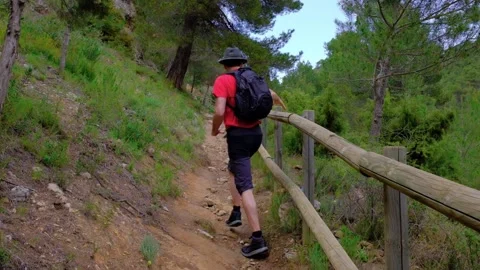 Man is dancing and jumping. Hiking in nature and having fun. Vídeos de archivo 197613972