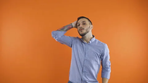 Man dancing and smiling wide. Slow popular club dance, touching hair and moving Stock Footage 138436353