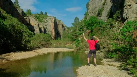 Man is dancing with a backpack. Male is hiking in nature. Stock Footage 205932011