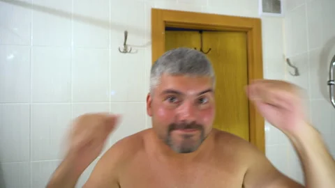 Man dancing in the bathroom 4K Stock Footage 156771813
