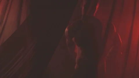 Man is dancing behind a thin cloth Stock Footage 103233562