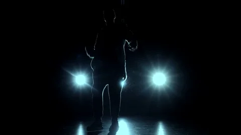 Man dancing in blue lights Stock Footage 76163985