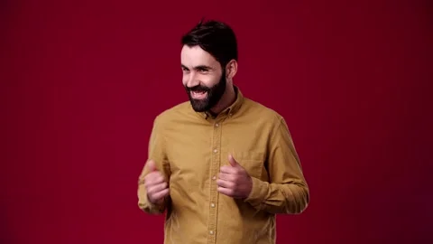 The man is dancing for the camera, he is on the positive Stock Footage 165620995